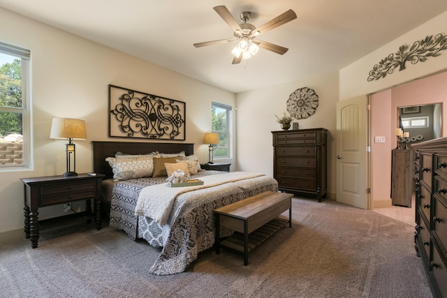 31 Express Blvd, Sandia Park, NM 87047 - bedroom with light colored carpet and ceiling fan