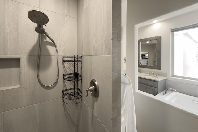 31 Express Blvd, Sandia Park, NM 87047 - bathroom featuring a tile shower, a bath, and vanity