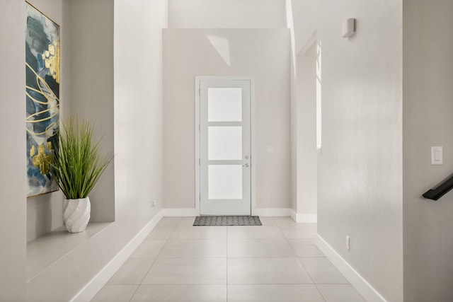 6527 Trestle Glen Rd NW, Albuquerque, NM 87120 - foyer entrance featuring light tile patterned flooring and baseboards