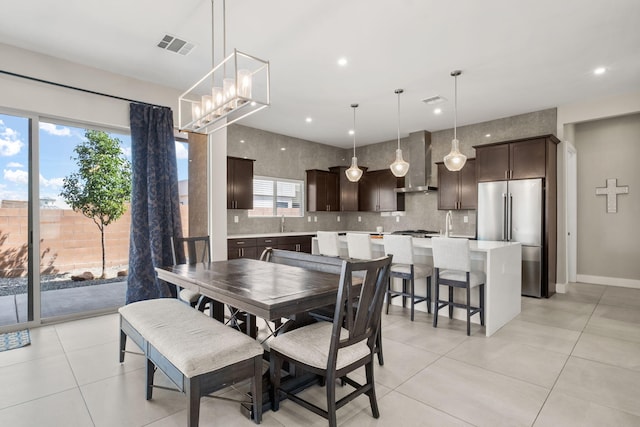 6527 Trestle Glen Rd NW, Albuquerque, NM 87120 - dining space featuring light tile patterned flooring and recessed lighting