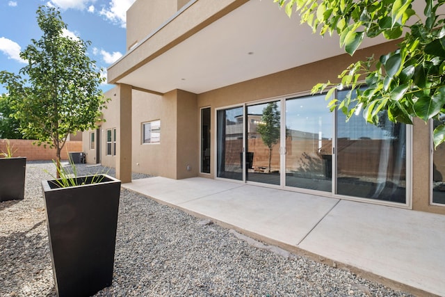 6527 Trestle Glen Rd NW, Albuquerque, NM 87120 - view of patio with central AC unit