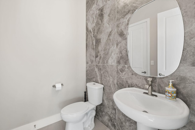 6527 Trestle Glen Rd NW, Albuquerque, NM 87120 - half bath with a sink and tile walls