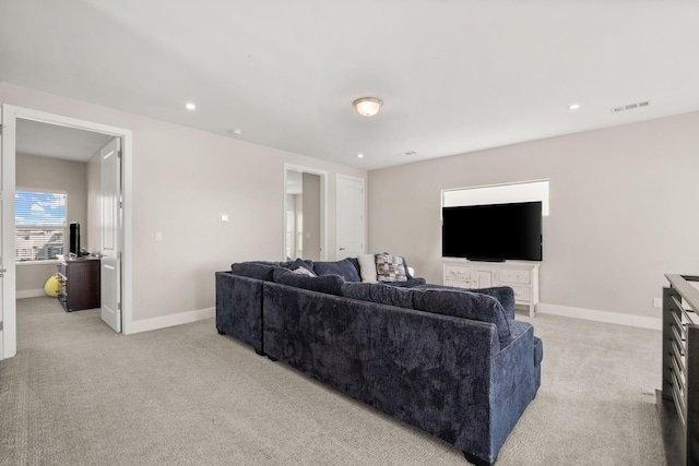 6527 Trestle Glen Rd NW, Albuquerque, NM 87120 - living area featuring light carpet, baseboards, and recessed lighting