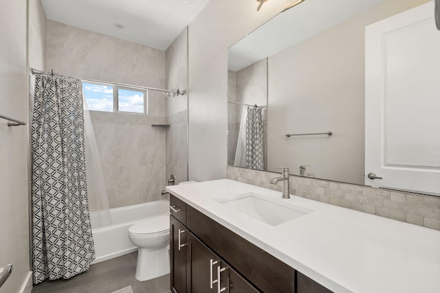 6527 Trestle Glen Rd NW, Albuquerque, NM 87120 - bathroom with vanity, toilet, and shower / tub combo