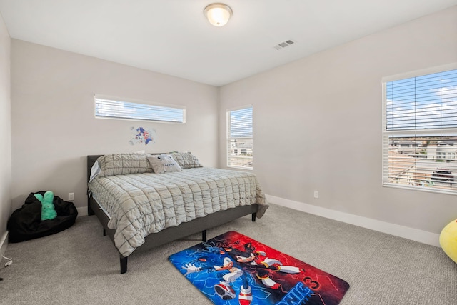 6527 Trestle Glen Rd NW, Albuquerque, NM 87120 - carpeted bedroom with baseboards