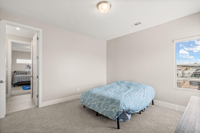 6527 Trestle Glen Rd NW, Albuquerque, NM 87120 - bedroom with carpet and baseboards