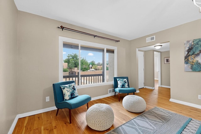 3801 Simms Ave SE, Albuquerque, NM 87108 - sitting room featuring wood finished floors and baseboards