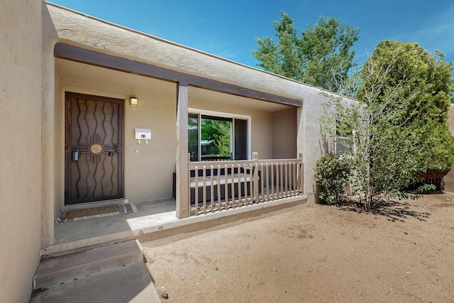 3801 Simms Ave SE, Albuquerque, NM 87108 - property entrance featuring stucco siding