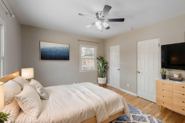 3801 Simms Ave SE, Albuquerque, NM 87108 - bedroom with light wood-type flooring and ceiling fan