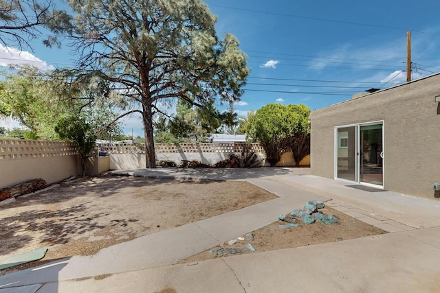 3801 Simms Ave SE, Albuquerque, NM 87108 - fenced backyard with a patio area