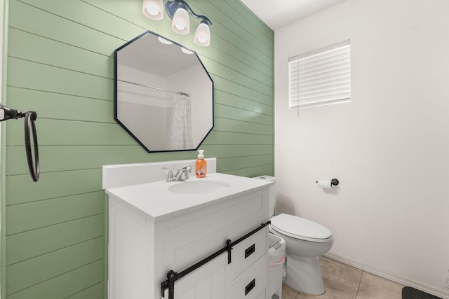 3758 Cattle Dr NE, Rio Rancho, NM 87144 - full bathroom featuring wooden walls, vanity, and tile patterned floors