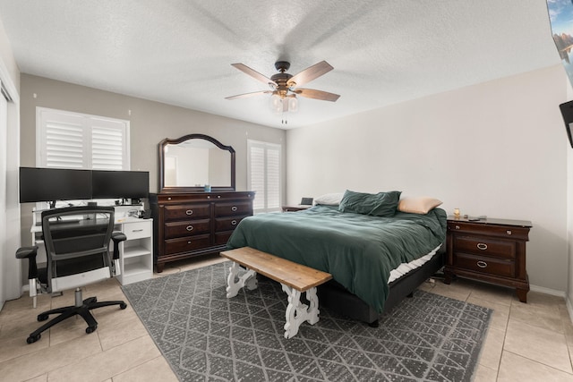 3758 Cattle Dr NE, Rio Rancho, NM 87144 - bedroom featuring tile patterned floors, an office area, a ceiling fan, and a textured ceiling