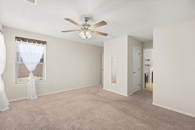 2170 Firewheel Ave SW, Los Lunas, NM 87031 - carpeted empty room with ceiling fan and a textured ceiling