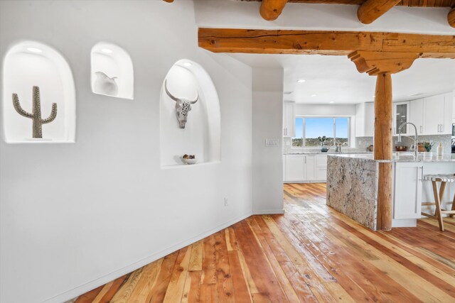 30A Arroyo Coyote Rd, Santa Fe, NM 87508 - hall with light wood-style flooring, beam ceiling, and recessed lighting