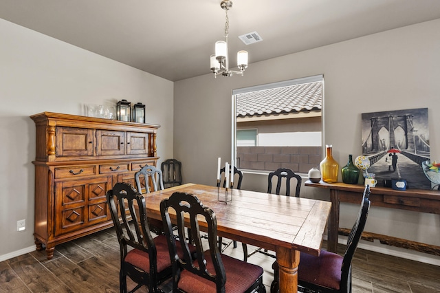 9035 S Sky St NW, Albuquerque, NM 87114 - dining room with a chandelier, dark wood-style floors, and baseboards