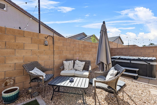 9035 S Sky St NW, Albuquerque, NM 87114 - fenced backyard featuring a hot tub and a patio area