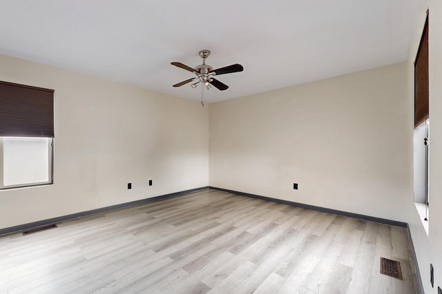 2815 Quail Pointe Dr NW, Albuquerque, NM 87120 - empty room with a ceiling fan, light wood-type flooring, and baseboards