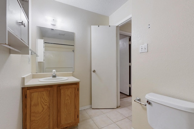 2815 Quail Pointe Dr NW, Albuquerque, NM 87120 - bathroom with toilet, vanity, and tile patterned floors