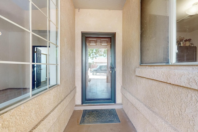 1375 Golden Eye Loop NE, Rio Rancho, NM 87144 - view of exterior entry with stucco siding