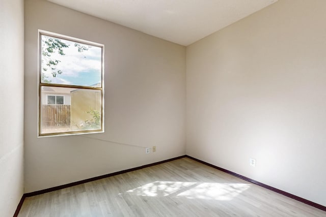 1375 Golden Eye Loop NE, Rio Rancho, NM 87144 - empty room featuring wood finished floors and baseboards