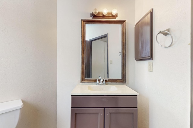 1375 Golden Eye Loop NE, Rio Rancho, NM 87144 - bathroom featuring vanity and toilet
