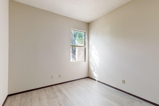 1375 Golden Eye Loop NE, Rio Rancho, NM 87144 - empty room with light wood-type flooring and baseboards