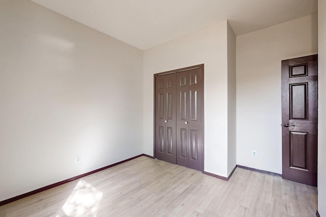 1375 Golden Eye Loop NE, Rio Rancho, NM 87144 - unfurnished bedroom featuring light wood-style flooring and baseboards