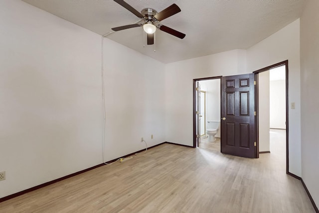 1375 Golden Eye Loop NE, Rio Rancho, NM 87144 - spare room featuring light wood-style flooring, baseboards, and ceiling fan
