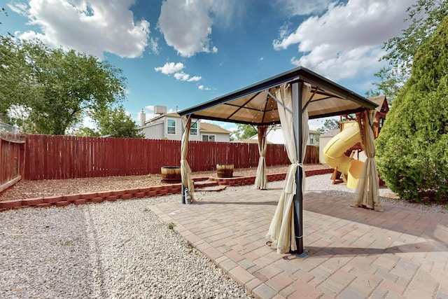 1375 Golden Eye Loop NE, Rio Rancho, NM 87144 - fenced backyard featuring a gazebo and a patio