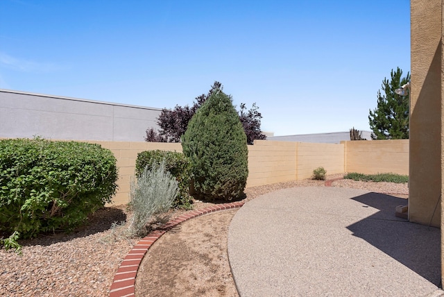 7913 Woodridge Dr NE, Albuquerque, NM 87109 - fenced backyard featuring a patio