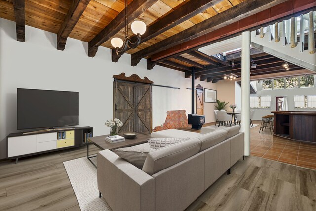 4 Pop Chalee, Glorieta, NM 87535 - living room featuring wood ceiling with exposed beams, a barn door, and wood finished floors