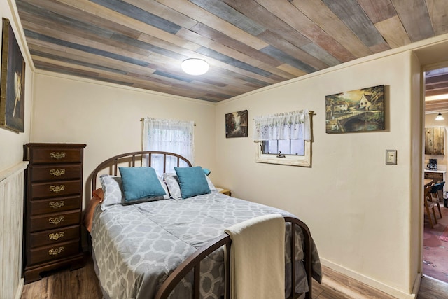 4 Pop Chalee, Glorieta, NM 87535 - bedroom featuring wood ceiling and wood finished floors