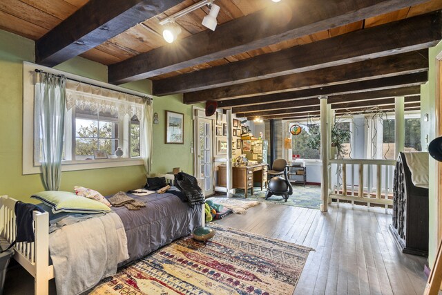 4 Pop Chalee, Glorieta, NM 87535 - bedroom with wooden ceiling with exposed beams and hardwood / wood-style flooring