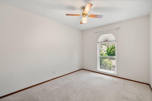 7401 Volunteer St NE, Albuquerque, NM 87109 - unfurnished room with carpet floors, baseboards, and a ceiling fan