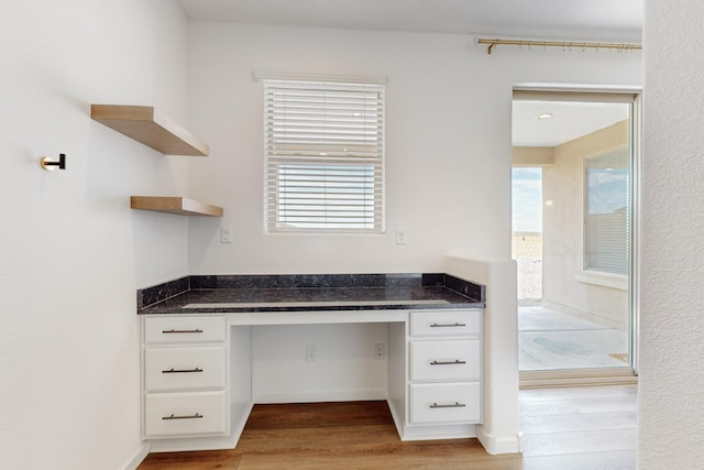3034 Shannon Ln NE, Rio Rancho, NM 87144 - unfurnished office featuring built in study area and light wood-style flooring