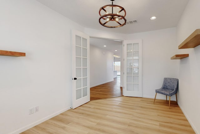3034 Shannon Ln NE, Rio Rancho, NM 87144 - interior space with french doors, light wood-style flooring, recessed lighting, baseboards, and a chandelier