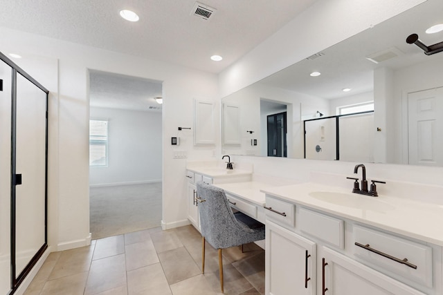 3034 Shannon Ln NE, Rio Rancho, NM 87144 - full bath featuring a stall shower, double vanity, recessed lighting, tile patterned flooring, and baseboards