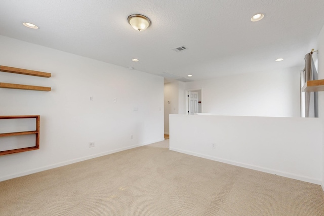 3034 Shannon Ln NE, Rio Rancho, NM 87144 - empty room featuring recessed lighting, light carpet, and baseboards