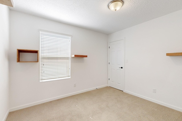3034 Shannon Ln NE, Rio Rancho, NM 87144 - unfurnished room with carpet and baseboards