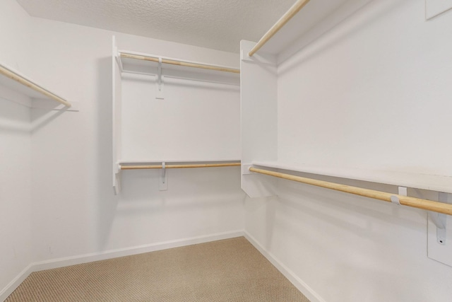 3034 Shannon Ln NE, Rio Rancho, NM 87144 - spacious closet featuring carpet floors