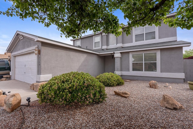 6308 Turquoise Trl NE, Rio Rancho, NM 87144 - view of front of property with stucco siding and an attached garage
