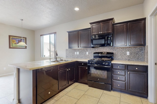221 Landing Trl, Rio Rancho, NM 87124 - kitchen with black appliances, a sink, backsplash, a peninsula, and dark brown cabinetry