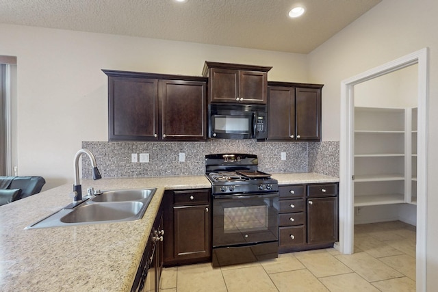 221 Landing Trl, Rio Rancho, NM 87124 - kitchen with black appliances, a sink, light countertops, tasteful backsplash, and dark brown cabinetry