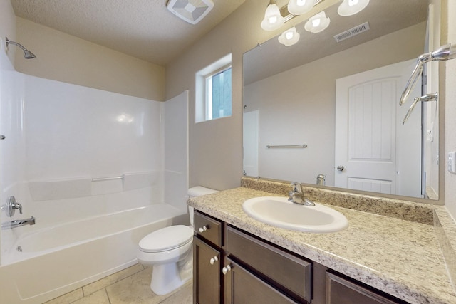 221 Landing Trl, Rio Rancho, NM 87124 - full bathroom featuring toilet, vanity, tub / shower combination, tile patterned flooring, and a textured ceiling