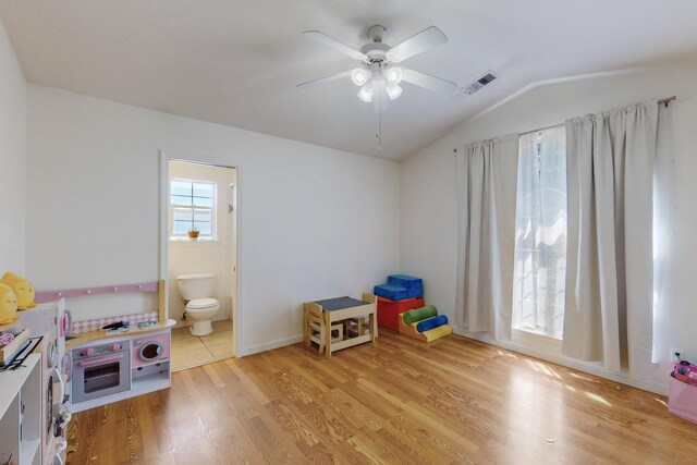 1034 Wagon Trail St, Los Lunas, NM 87031 - recreation room featuring vaulted ceiling, light wood-style flooring, and ceiling fan