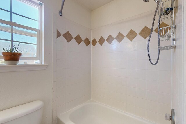 1034 Wagon Trail St, Los Lunas, NM 87031 - full bathroom with toilet and tub / shower combination