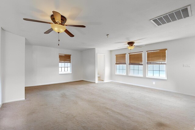 1034 Wagon Trail St, Los Lunas, NM 87031 - carpeted empty room featuring a ceiling fan