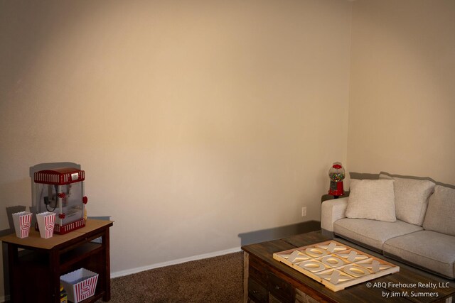 8704 Espacio Verde Rd, Albuquerque, NM 87120 - carpeted living area featuring baseboards