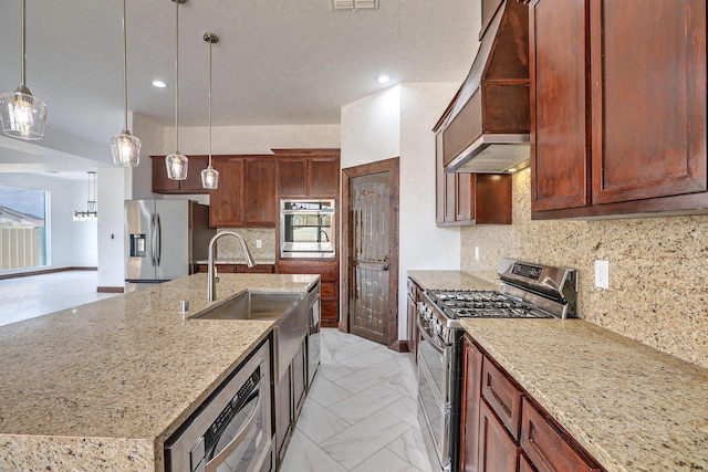 1209 11th St SE, Rio Rancho, NM 87124 - kitchen with appliances with stainless steel finishes, hanging light fixtures, a kitchen island with sink, a sink, and light marble finish floors