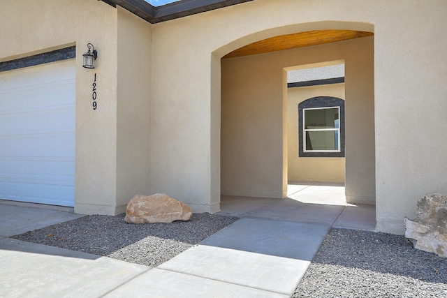 1209 11th St SE, Rio Rancho, NM 87124 - property entrance with stucco siding